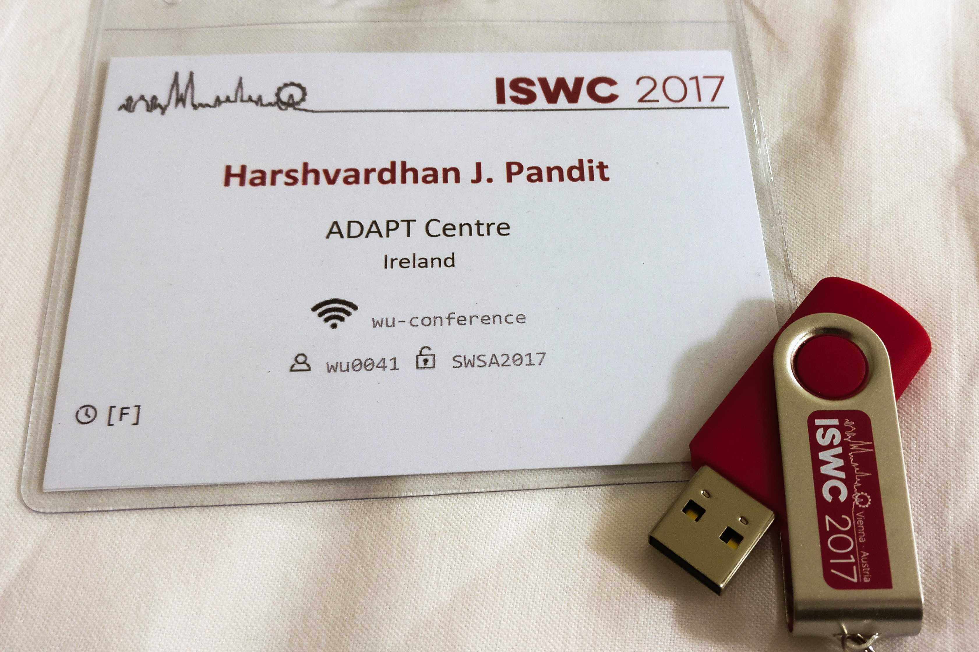 My ISWC conference badge and a complimentary USB drive with all the program and papers on it.